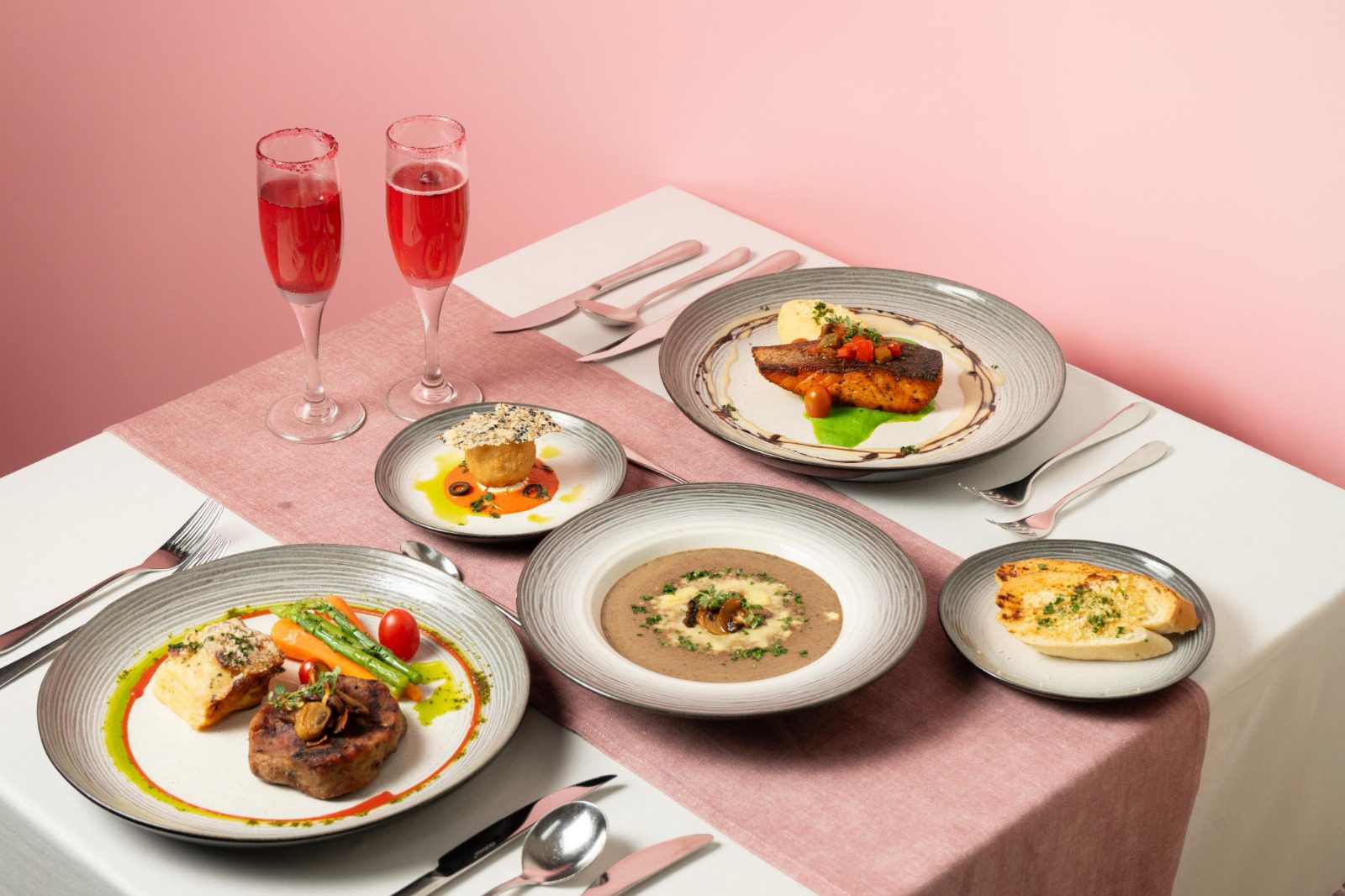 The package includes a set menu for a romantic dinner, four courses: appetizer, soup, main course, and dessert, with compulsory special mocktails for the couple